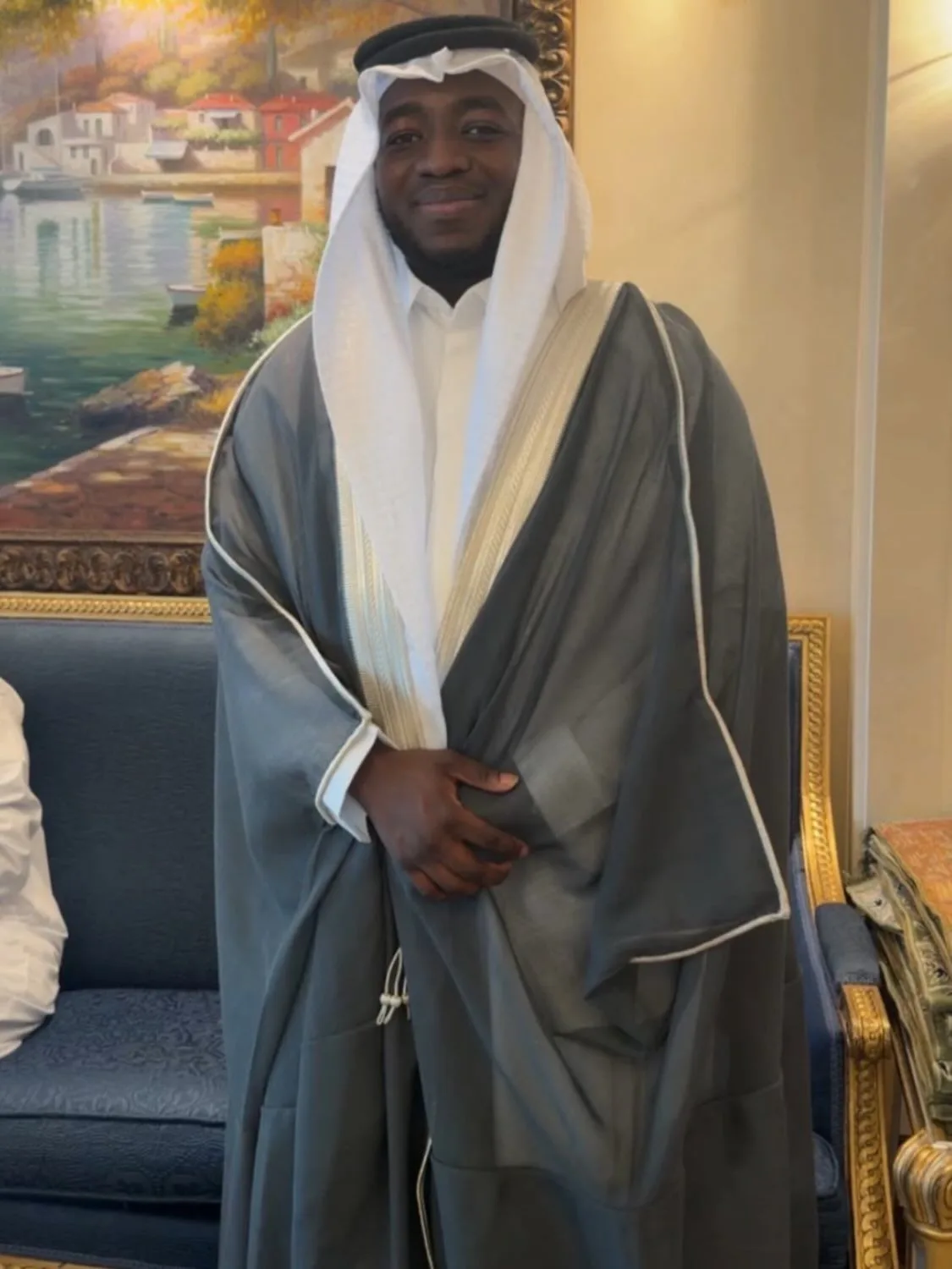 Ahmad Yari in bisht and ghutra