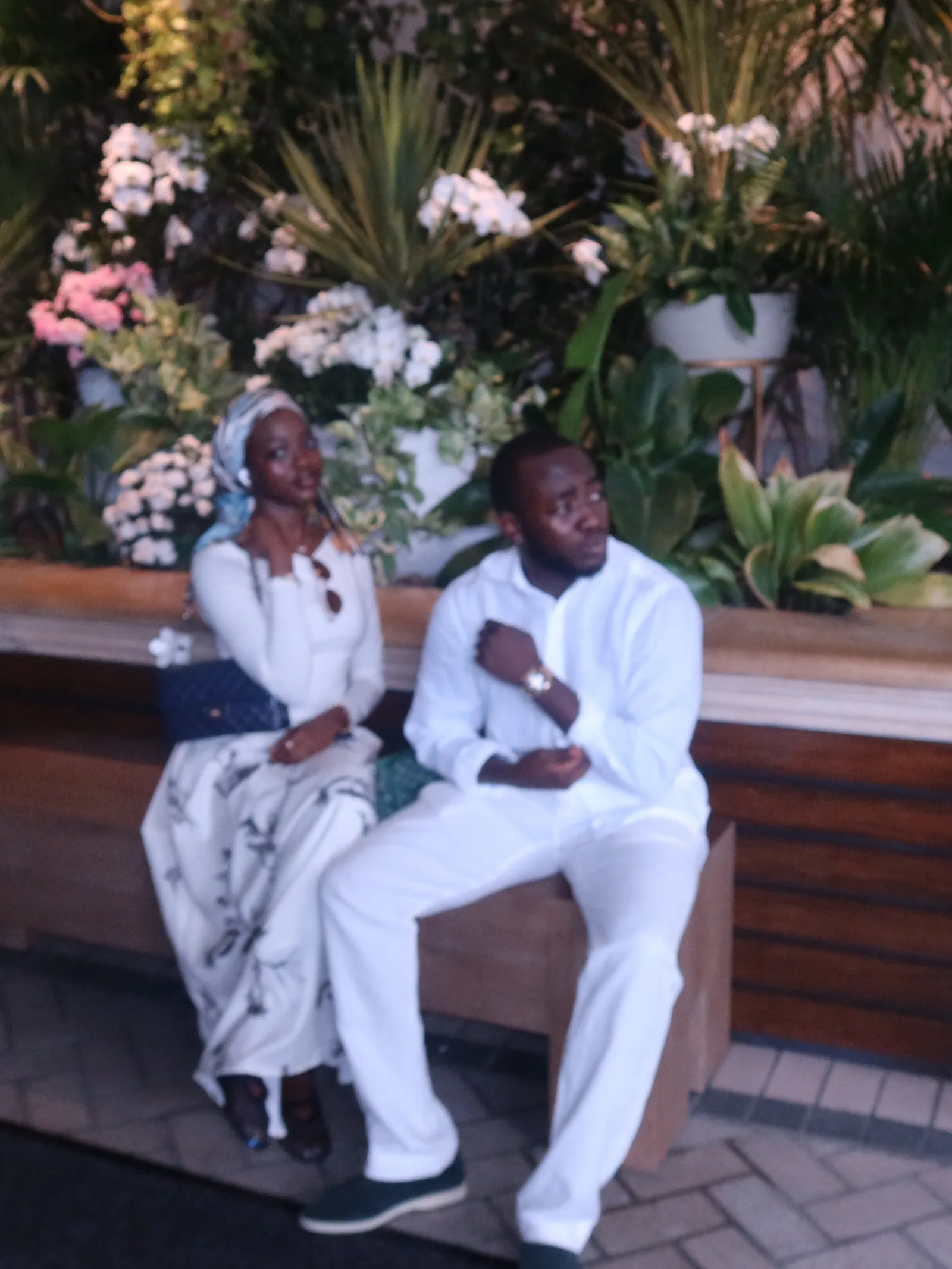 Ahmad Yari with family among flowers